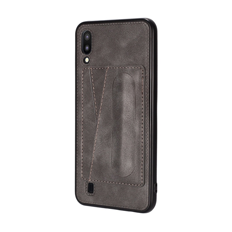 For Galaxy A10 Shockproof PC + PU Protective Case with Spring Holder & Card Slot
