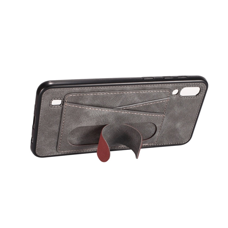 For Galaxy A10 Shockproof PC + PU Protective Case with Spring Holder & Card Slot