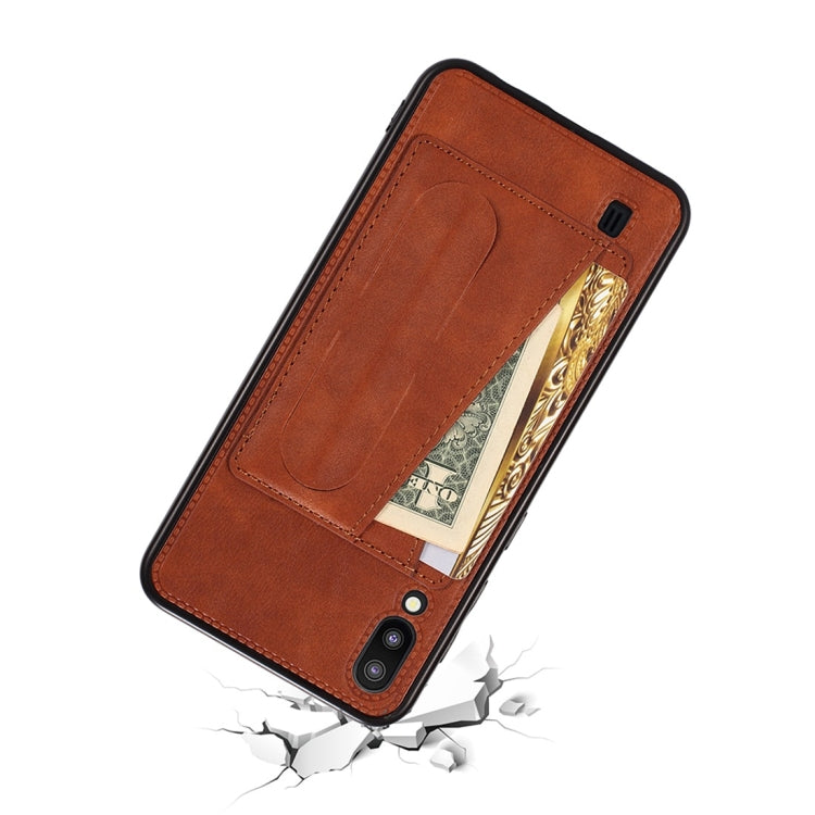 For Galaxy A10 Shockproof PC + PU Protective Case with Spring Holder & Card Slot