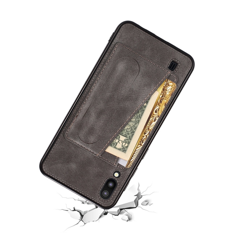For Galaxy M20 Shockproof PC + PU Protective Case with Spring Holder & Card Slot