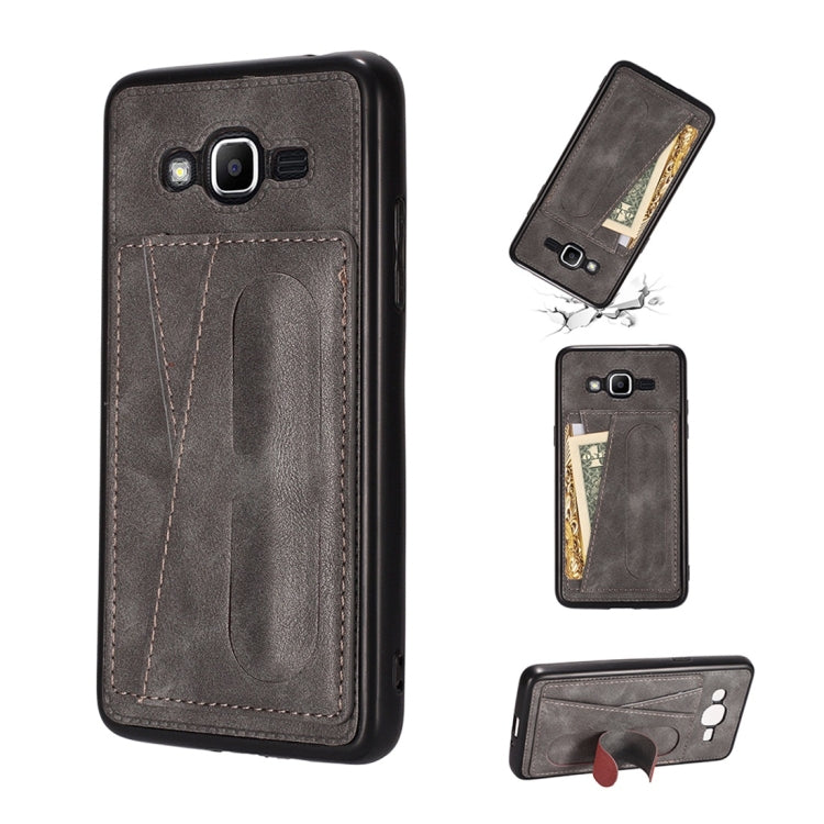For Galaxy J2 Prime Shockproof PC + PU Protective Case with Spring Holder & Card Slot