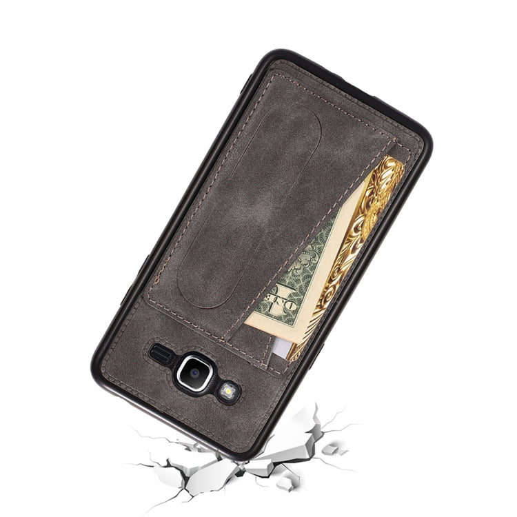 For Galaxy J2 Prime Shockproof PC + PU Protective Case with Spring Holder & Card Slot