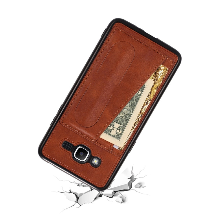 For Galaxy J2 Prime Shockproof PC + PU Protective Case with Spring Holder & Card Slot