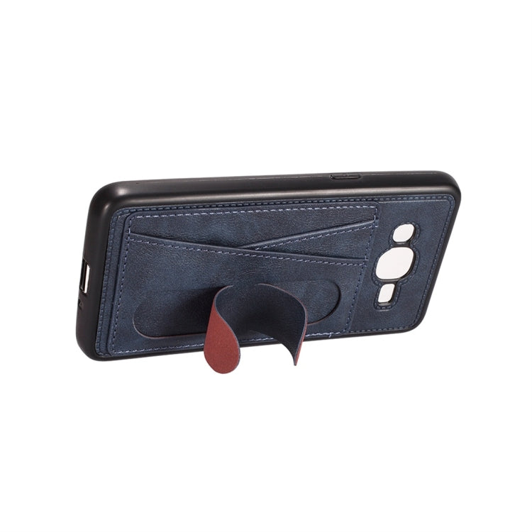 For Galaxy J2 Prime Shockproof PC + PU Protective Case with Spring Holder & Card Slot