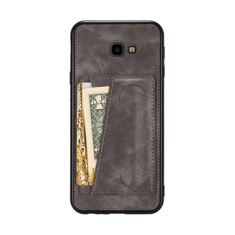 For Galaxy J4+ Shockproof PC + PU Protective Case with Spring Holder & Card Slot