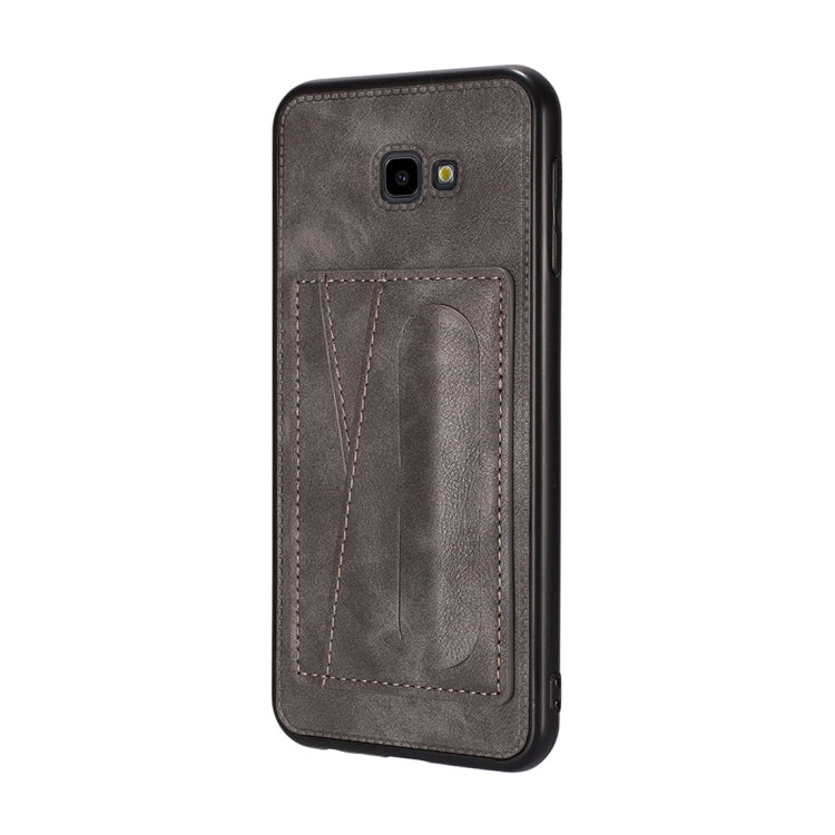 For Galaxy J4+ Shockproof PC + PU Protective Case with Spring Holder & Card Slot