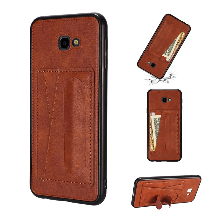 For Galaxy J4+ Shockproof PC + PU Protective Case with Spring Holder & Card Slot