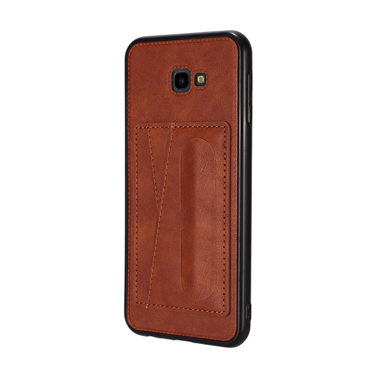 For Galaxy J4+ Shockproof PC + PU Protective Case with Spring Holder & Card Slot