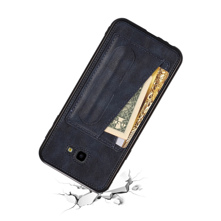 For Galaxy J4+ Shockproof PC + PU Protective Case with Spring Holder & Card Slot