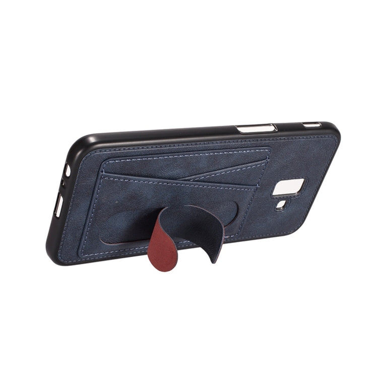 For Galaxy J6 (2018) Shockproof PC + PU Protective Case with Spring Holder & Card Slot