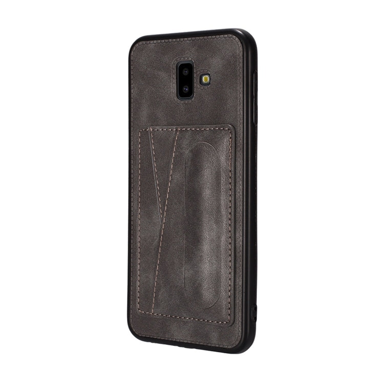 For Galaxy J8 (2018) Shockproof PC + PU Protective Case with Spring Holder & Card Slot
