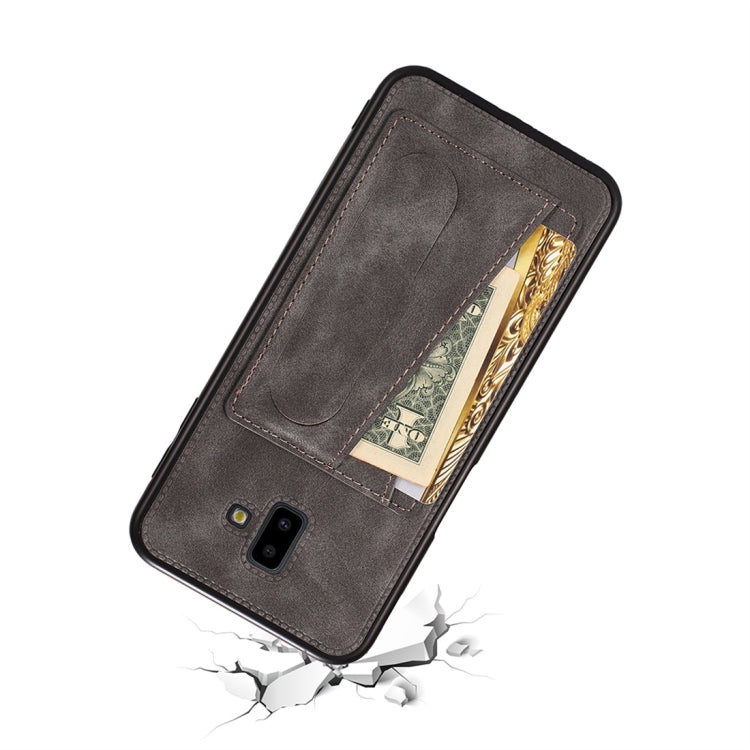 For Galaxy J8 (2018) Shockproof PC + PU Protective Case with Spring Holder & Card Slot