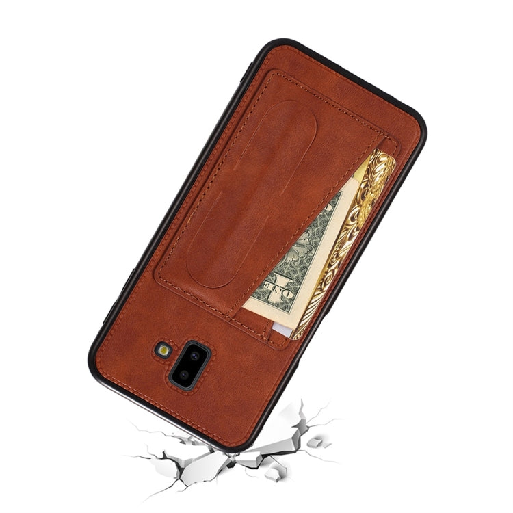 For Galaxy J8 (2018) Shockproof PC + PU Protective Case with Spring Holder & Card Slot