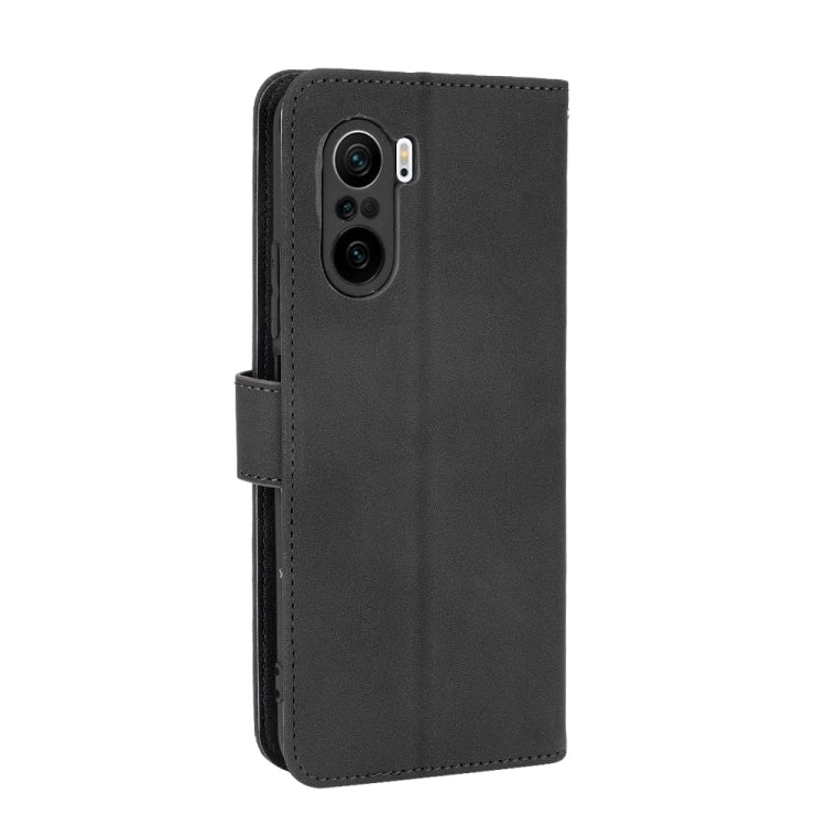 For Xiaomi Redmi K40 / K40 Pro Solid Color Skin Feel Magnetic Buckle Horizontal Flip Calf Texture PU Leather Case with Holder & Card Slots & Wallet