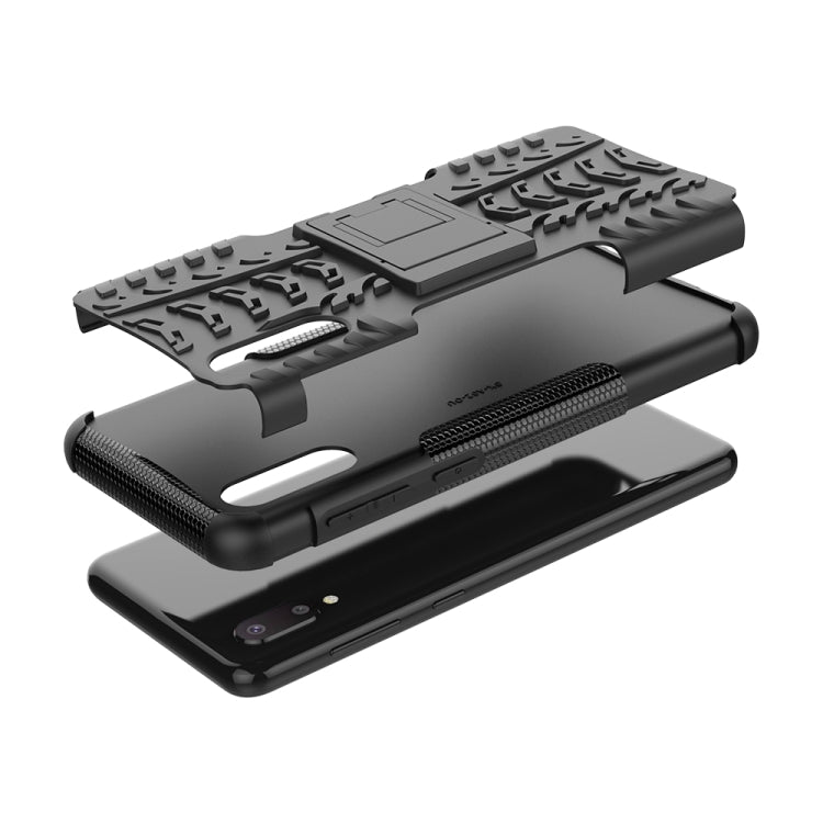 For Samsung Galaxy A02(EU Version) Tire Texture Shockproof TPU+PC Protective Case with Holder