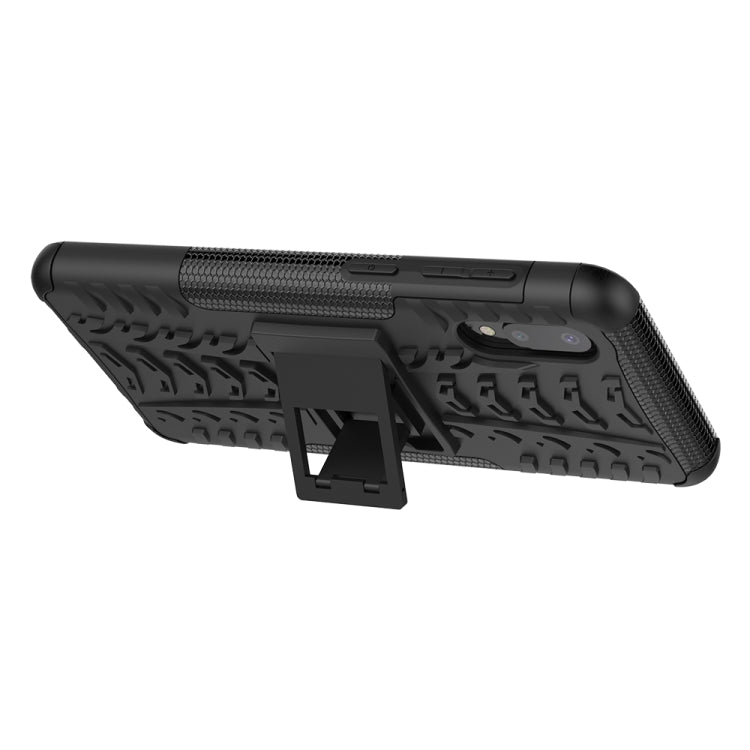 For Samsung Galaxy A02(EU Version) Tire Texture Shockproof TPU+PC Protective Case with Holder