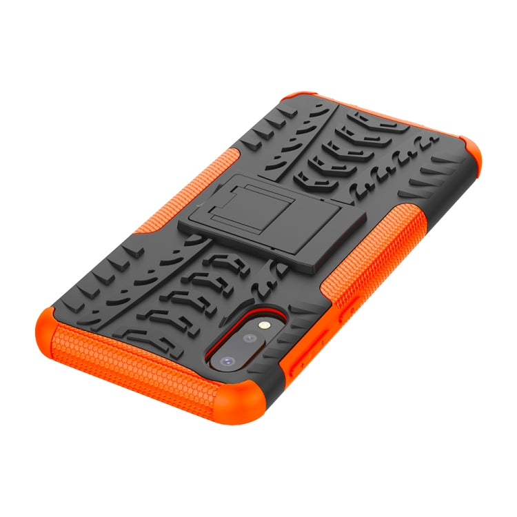 For Samsung Galaxy A02(EU Version) Tire Texture Shockproof TPU+PC Protective Case with Holder