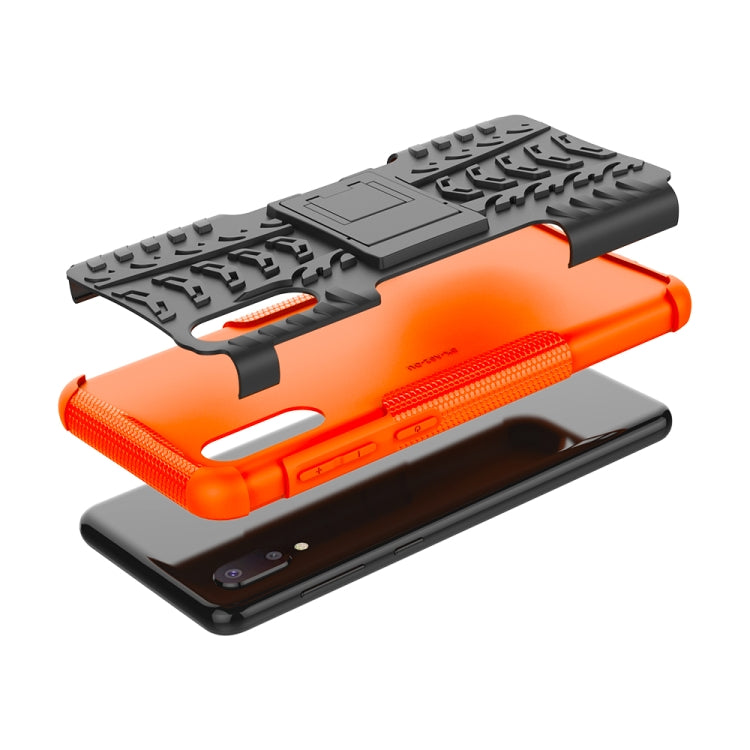 For Samsung Galaxy A02(EU Version) Tire Texture Shockproof TPU+PC Protective Case with Holder