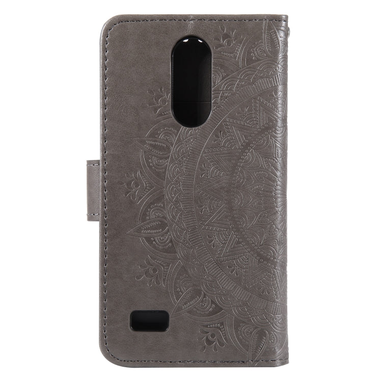 For LG K4 (2017) (US Version) Totem Flower Embossed Horizontal Flip TPU + PU Leather Case with Holder & Card Slots & Wallet