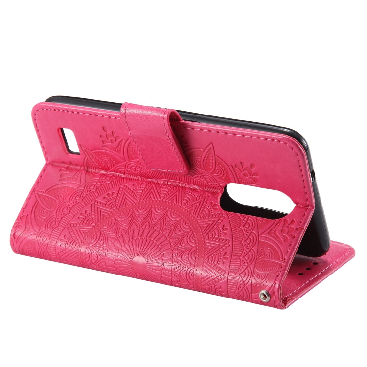 For LG K4 (2017) (US Version) Totem Flower Embossed Horizontal Flip TPU + PU Leather Case with Holder & Card Slots & Wallet