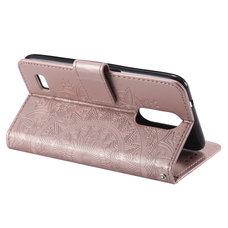 For LG K4 (2017) (US Version) Totem Flower Embossed Horizontal Flip TPU + PU Leather Case with Holder & Card Slots & Wallet