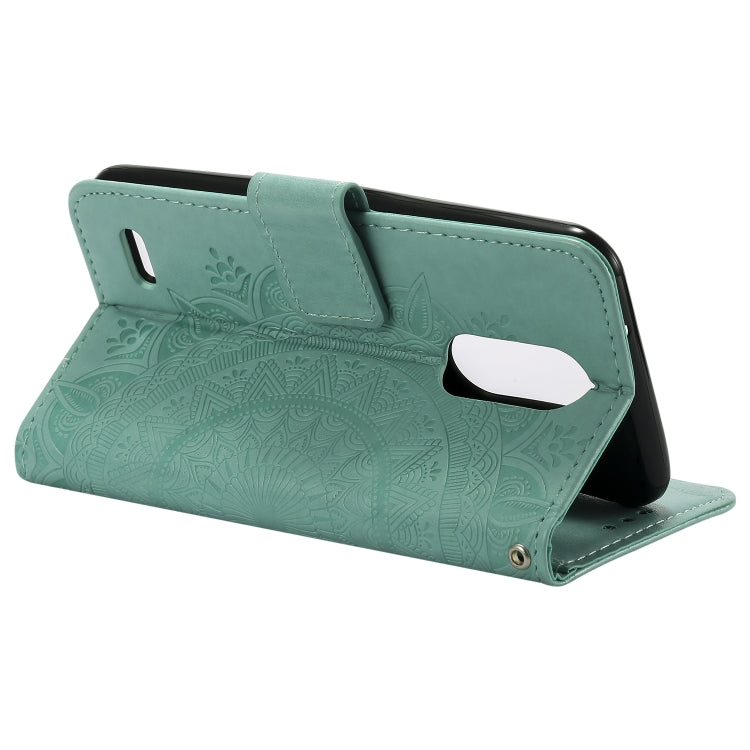 For LG K8 (2017) (EU Version) Totem Flower Embossed Horizontal Flip TPU + PU Leather Case with Holder & Card Slots & Wallet