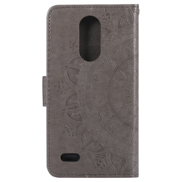 For LG K8 (2017) (EU Version) Totem Flower Embossed Horizontal Flip TPU + PU Leather Case with Holder & Card Slots & Wallet