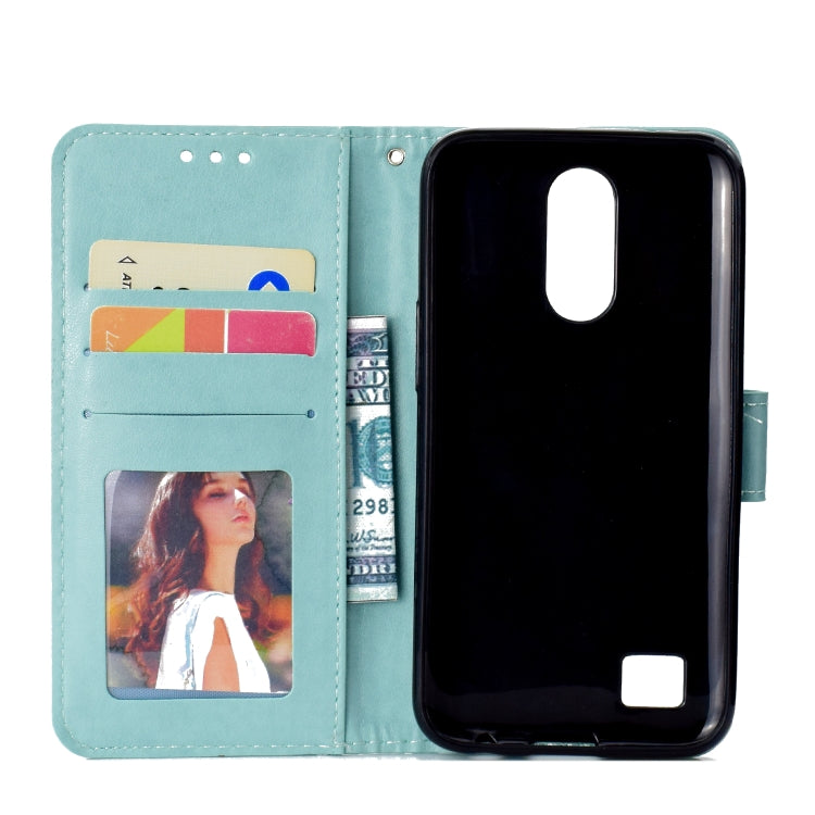 For LG K10 (2017) (EU / US Version)  Totem Flower Embossed Horizontal Flip TPU + PU Leather Case with Holder & Card Slots & Wallet