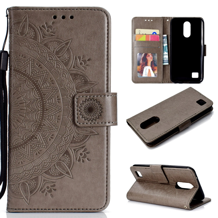 For LG K10 (2017) (EU / US Version)  Totem Flower Embossed Horizontal Flip TPU + PU Leather Case with Holder & Card Slots & Wallet