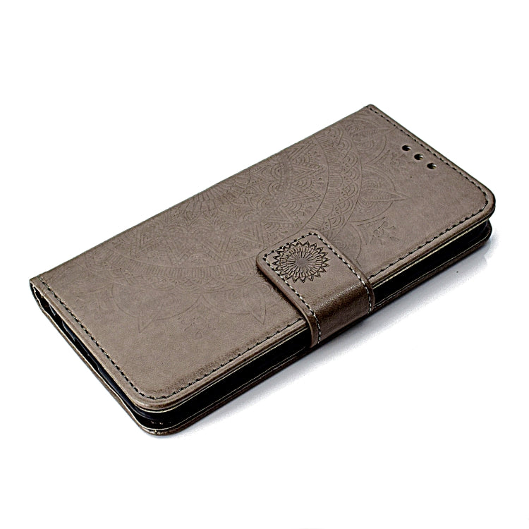 For LG K10 (2017) (EU / US Version)  Totem Flower Embossed Horizontal Flip TPU + PU Leather Case with Holder & Card Slots & Wallet