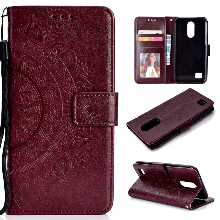 For LG K10 (2017) (EU / US Version)  Totem Flower Embossed Horizontal Flip TPU + PU Leather Case with Holder & Card Slots & Wallet