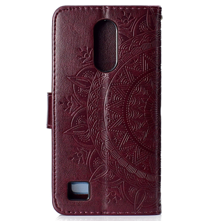 For LG K10 (2017) (EU / US Version)  Totem Flower Embossed Horizontal Flip TPU + PU Leather Case with Holder & Card Slots & Wallet