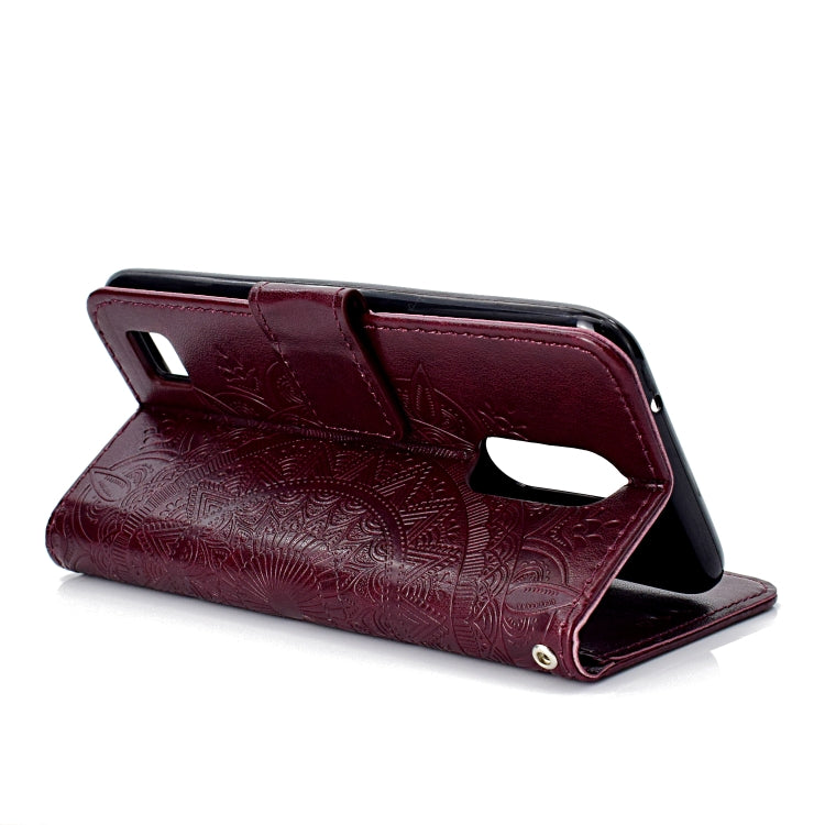 For LG K10 (2017) (EU / US Version)  Totem Flower Embossed Horizontal Flip TPU + PU Leather Case with Holder & Card Slots & Wallet