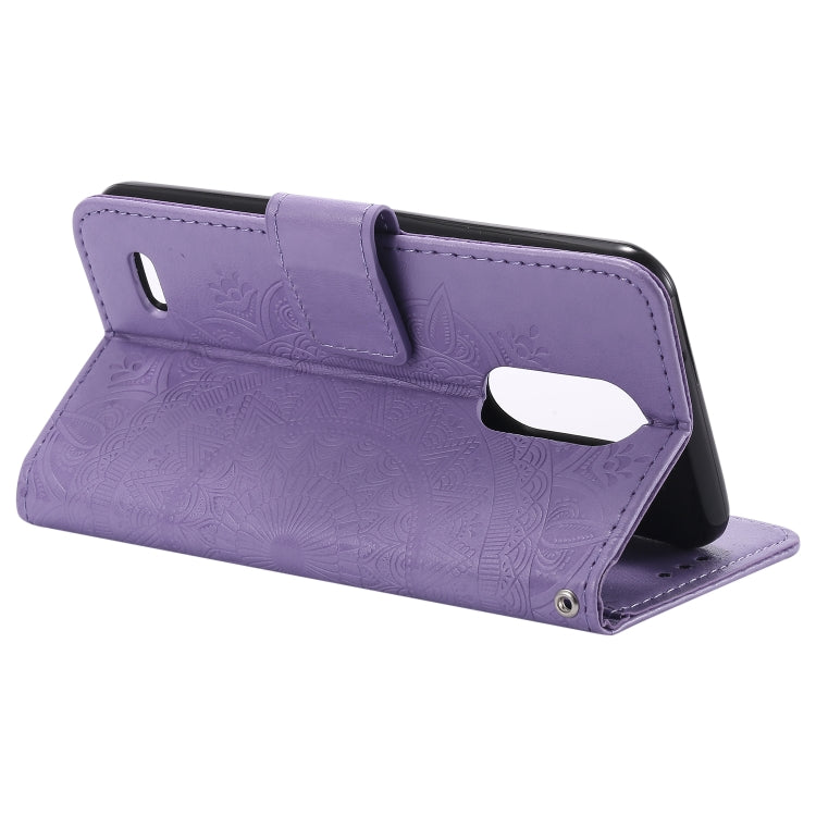 For LG K10 (2018) Totem Flower Embossed Horizontal Flip TPU + PU Leather Case with Holder & Card Slots & Wallet