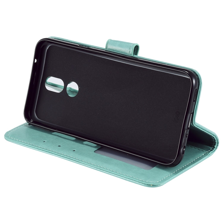 For LG K40 Totem Flower Embossed Horizontal Flip TPU + PU Leather Case with Holder & Card Slots & Wallet