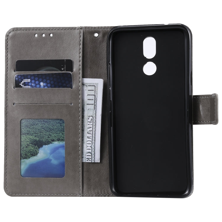 For LG K40 Totem Flower Embossed Horizontal Flip TPU + PU Leather Case with Holder & Card Slots & Wallet