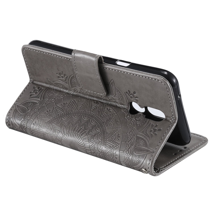 For LG K40 Totem Flower Embossed Horizontal Flip TPU + PU Leather Case with Holder & Card Slots & Wallet