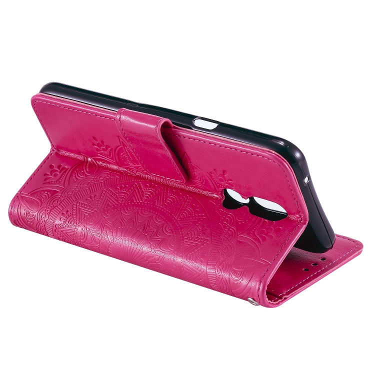 For LG K40 Totem Flower Embossed Horizontal Flip TPU + PU Leather Case with Holder & Card Slots & Wallet