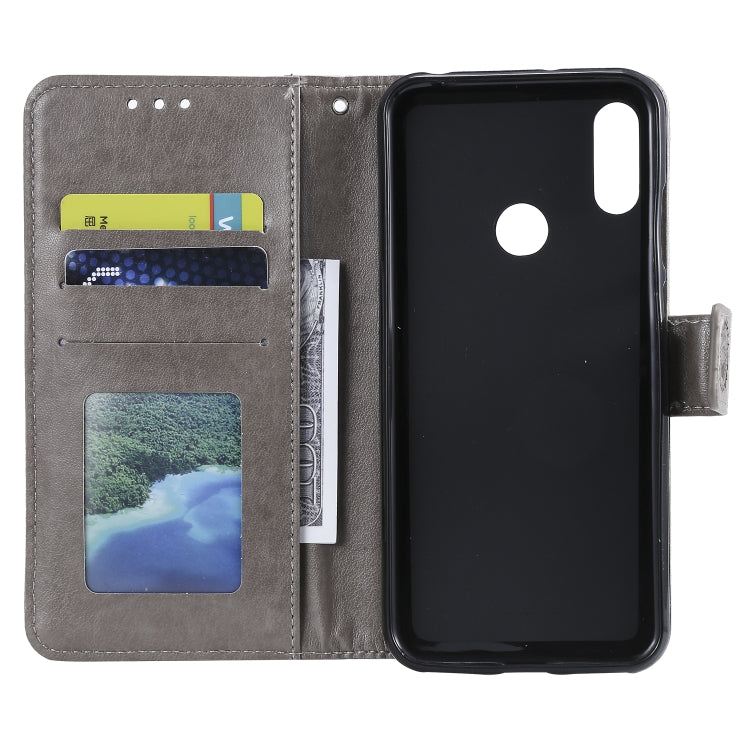 For Huawei Y6 (2019) Totem Flower Embossed Horizontal Flip TPU + PU Leather Case with Holder & Card Slots & Wallet