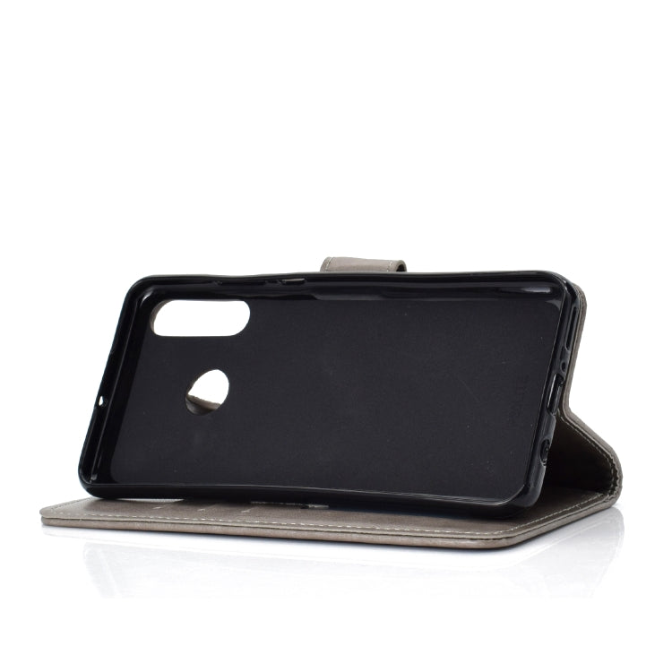 For Huawei P30 Lite Totem Flower Embossed Horizontal Flip TPU + PU Leather Case with Holder & Card Slots & Wallet