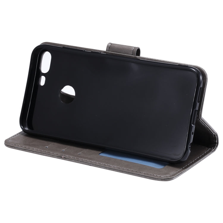 For Huawei Honor 9 Lite Totem Flower Embossed Horizontal Flip TPU + PU Leather Case with Holder & Card Slots & Wallet