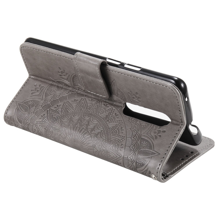 For Nokia 2.4 Totem Flower Embossed Horizontal Flip TPU + PU Leather Case with Holder & Card Slots & Wallet