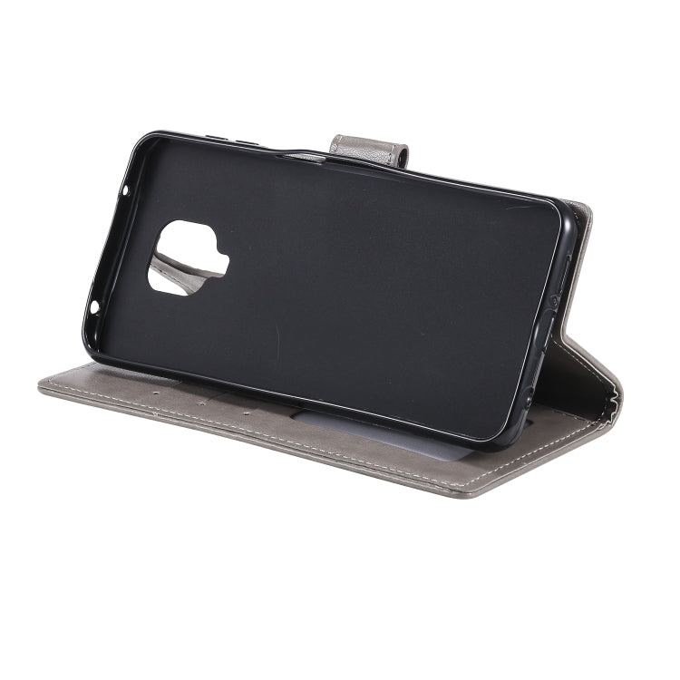 For Motorola Moto G9 Play Totem Flower Embossed Horizontal Flip TPU + PU Leather Case with Holder & Card Slots & Wallet