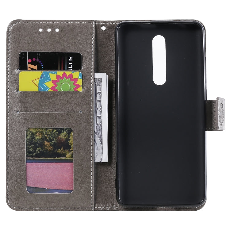 For Xiaomi Redmi K20 / K20 Pro Totem Flower Embossed Horizontal Flip TPU + PU Leather Case with Holder & Card Slots & Wallet