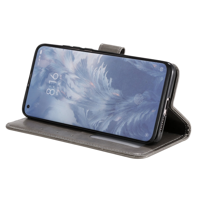 For Xiaomi Mi 10 5G Totem Flower Embossed Horizontal Flip TPU + PU Leather Case with Holder & Card Slots & Wallet