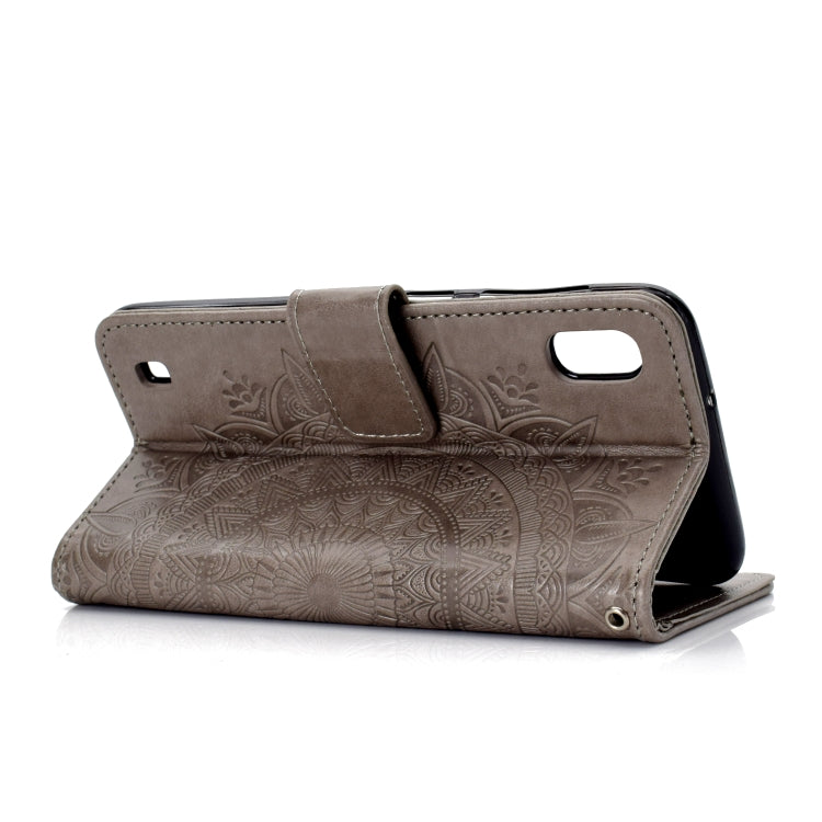 For Samsung Galaxy A10 Totem Flower Embossed Horizontal Flip TPU + PU Leather Case with Holder & Card Slots & Wallet