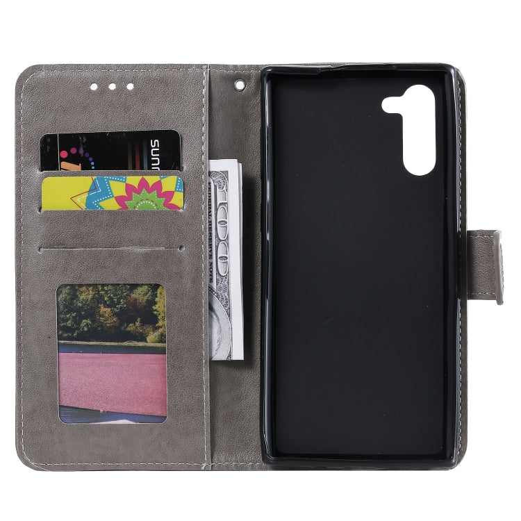 For Samsung Galaxy Note10 Totem Flower Embossed Horizontal Flip TPU + PU Leather Case with Holder & Card Slots & Wallet