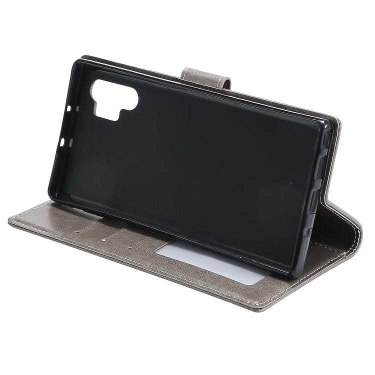 For Samsung Galaxy Note10 Plus Totem Flower Embossed Horizontal Flip TPU + PU Leather Case with Holder & Card Slots & Wallet