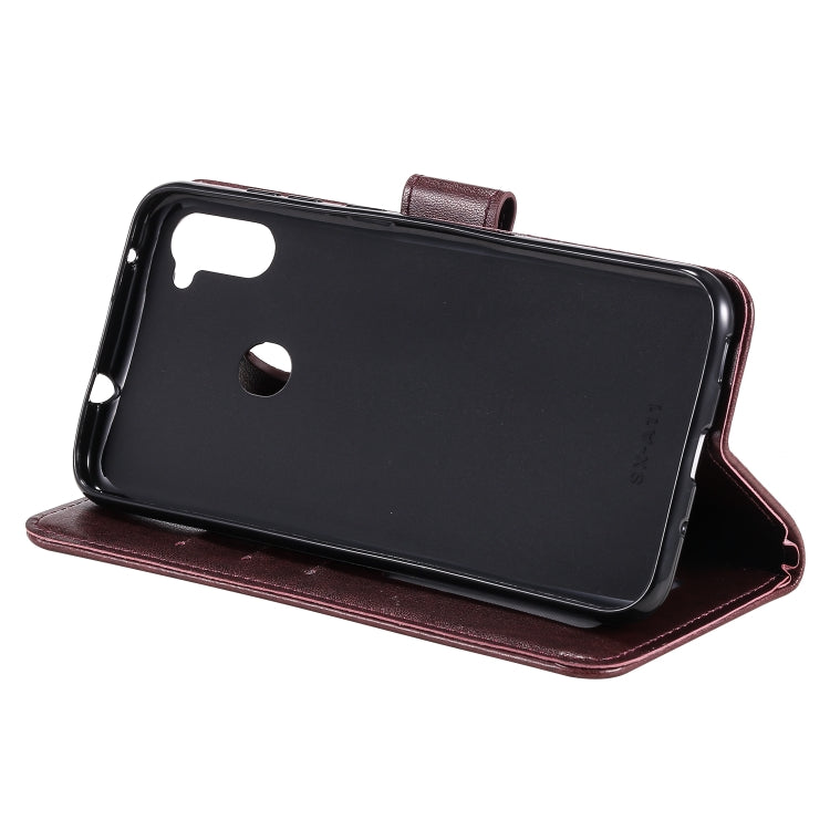 For Samsung Galaxy A11 Totem Flower Embossed Horizontal Flip TPU + PU Leather Case with Holder & Card Slots & Wallet