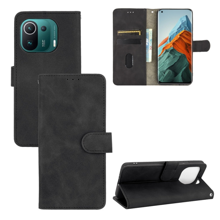 For Xiaomi Mi 11 Pro Solid Color Skin Feel Magnetic Buckle Horizontal Flip Calf Texture PU Leather Case with Holder & Card Slots & Wallet